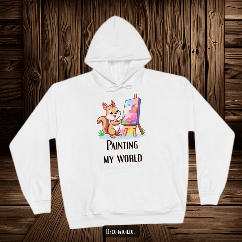 Funny Squirrel Hoodie: A cheerful character painting a vibrant mural on a large, colorful canvas, perfect for cozy artistic comfort.